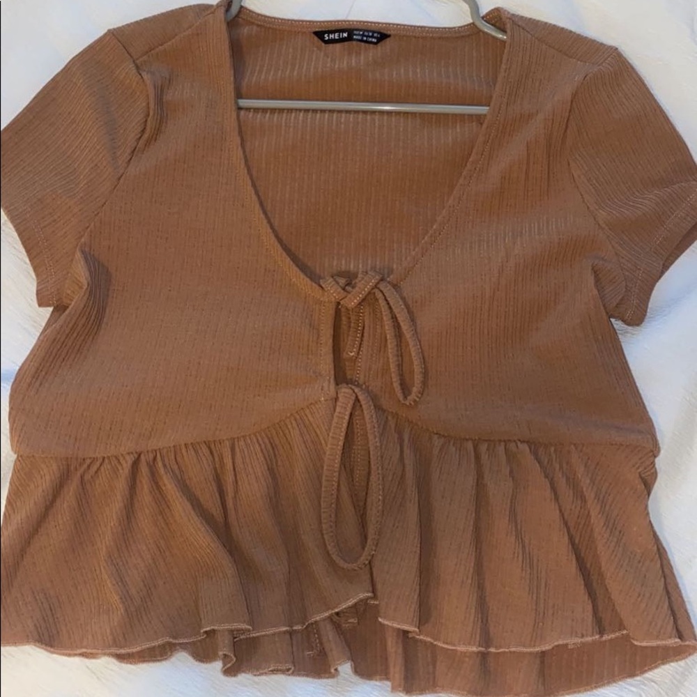 brown top that ties in the middle